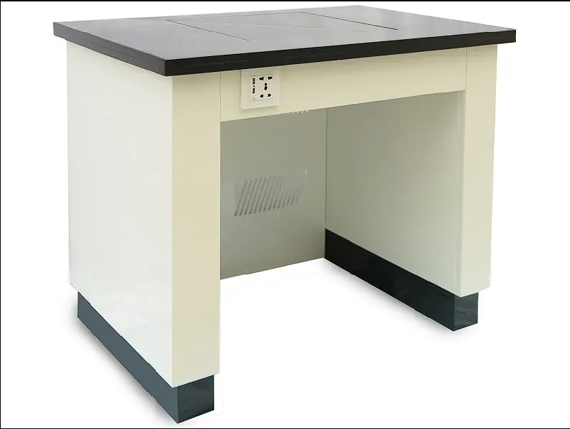 Anti-vibration balance table with black worktop, open knee space, and front power outlet