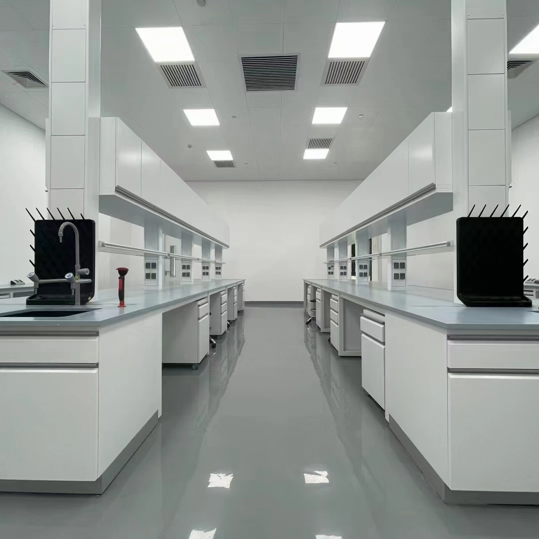 Laboratory island bench room layout showing double-sided work zones, storage and aisle access
