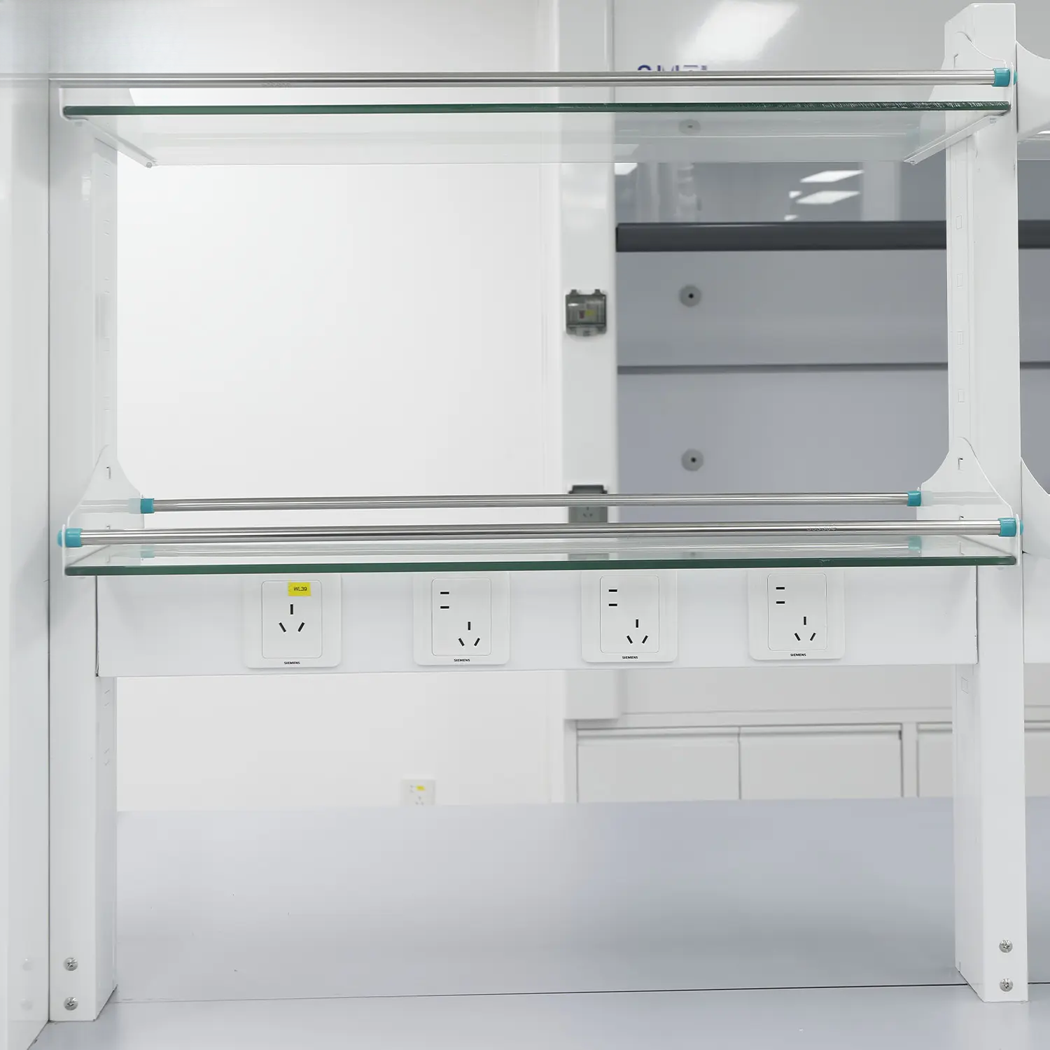 Laboratory reagent rack shelf detail with guard edge and selected service zone